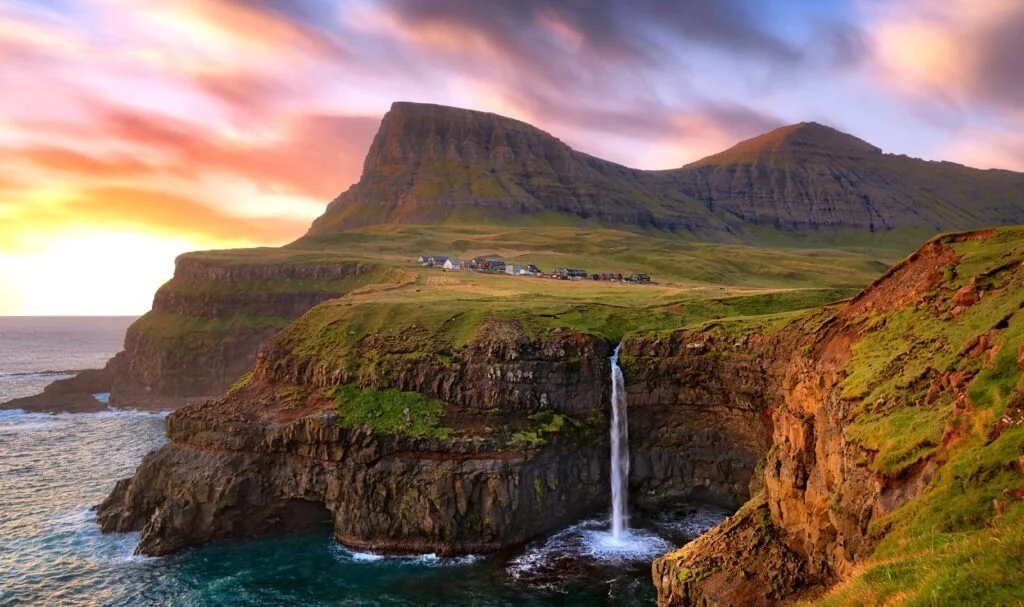 Múlafossur waterfall in sunset