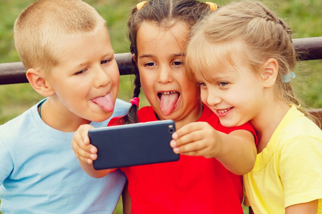 kids playing with mobile phone