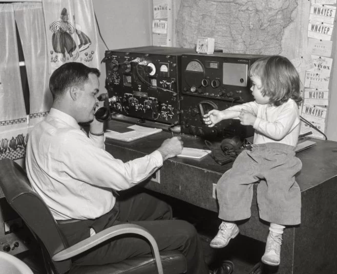 vintage HAM station with a kid
