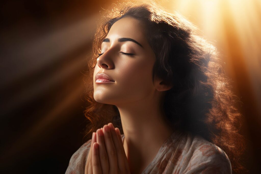 woman meditating praying