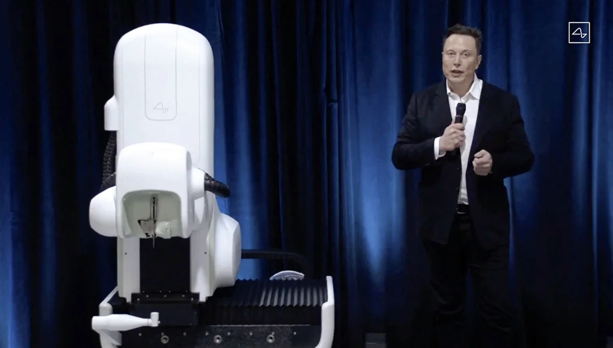 Elonk Musk explaining the optical coherence tomography (OCT) system Robot