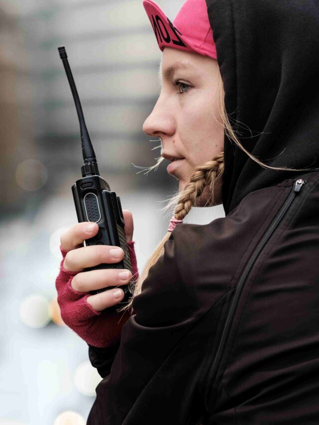 girl with DMR walkie
